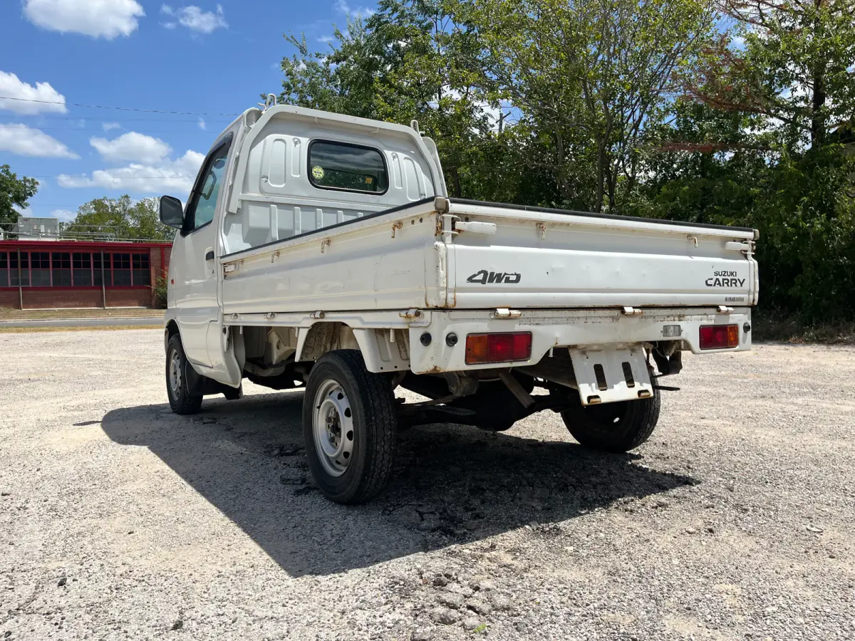 1999 Suzuki Carry, 4WD + AC, a Kei Truck, for sale at Sunshine Imports in Austin, TX (photo 4 of 9)