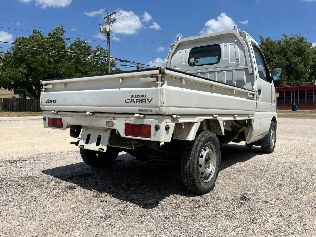 1999 Suzuki Carry, 4WD + AC, a Kei Truck, for sale at Sunshine Imports in Austin, TX (photo 5 of 9)