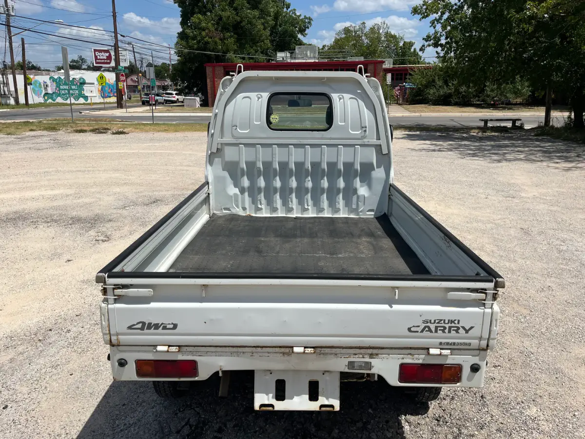 1999 Suzuki Carry, 4WD + AC, a Kei Truck, for sale at Sunshine Imports in Austin, TX (photo 7 of 9)