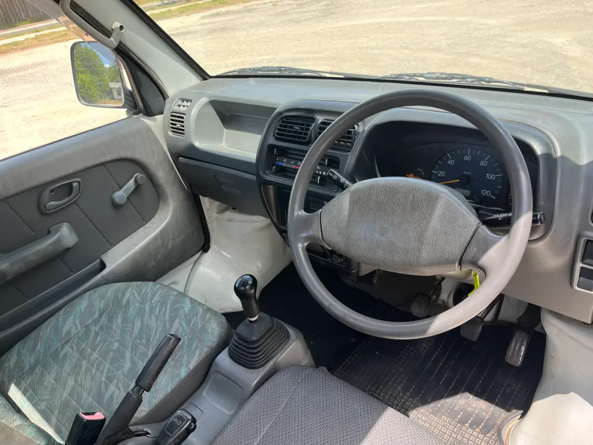 1999 Suzuki Carry, 4WD + AC, a Kei Truck, for sale at Sunshine Imports in Austin, TX (photo 9 of 9)