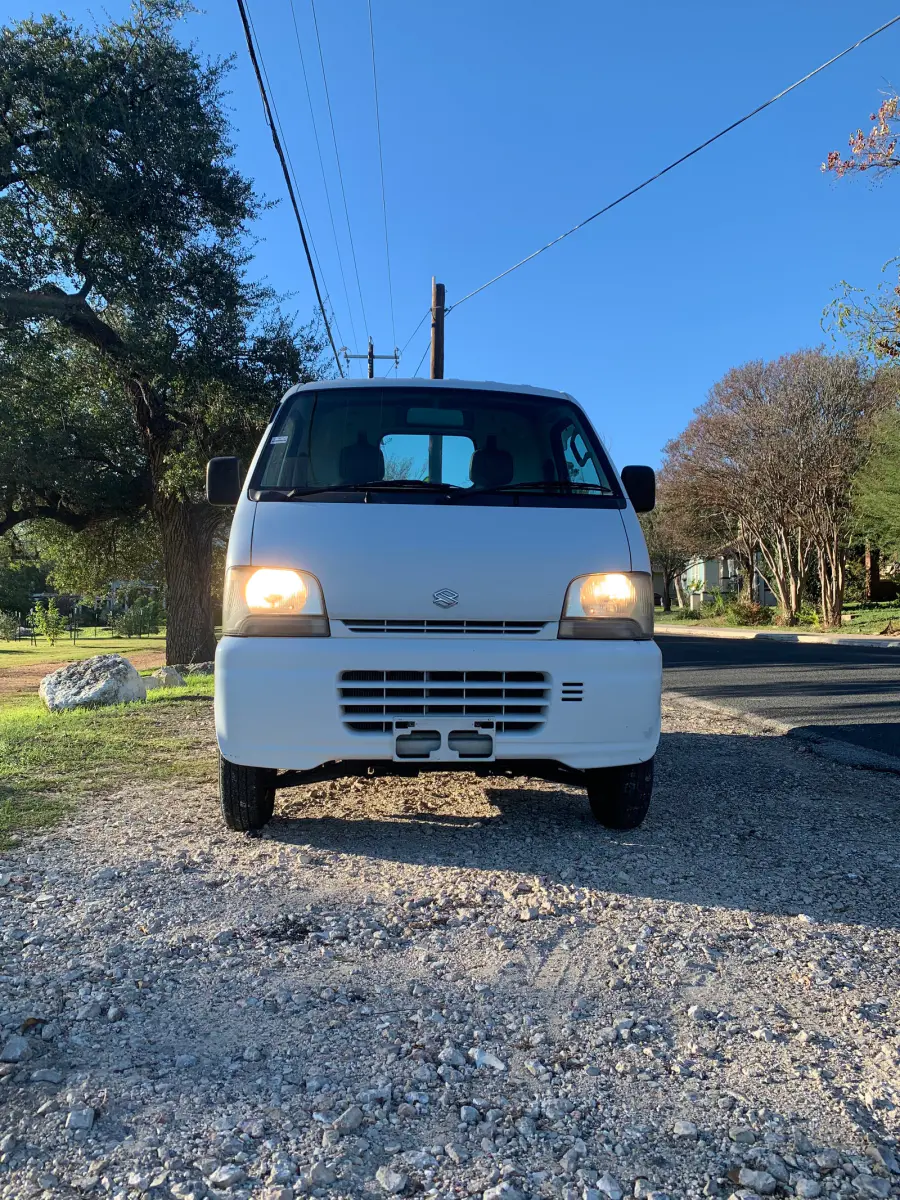 1999 Suzuki Carry, 4WD and AC, a Kei Truck, for sale at Sunshine Imports in Austin, TX (photo 3 of 10)