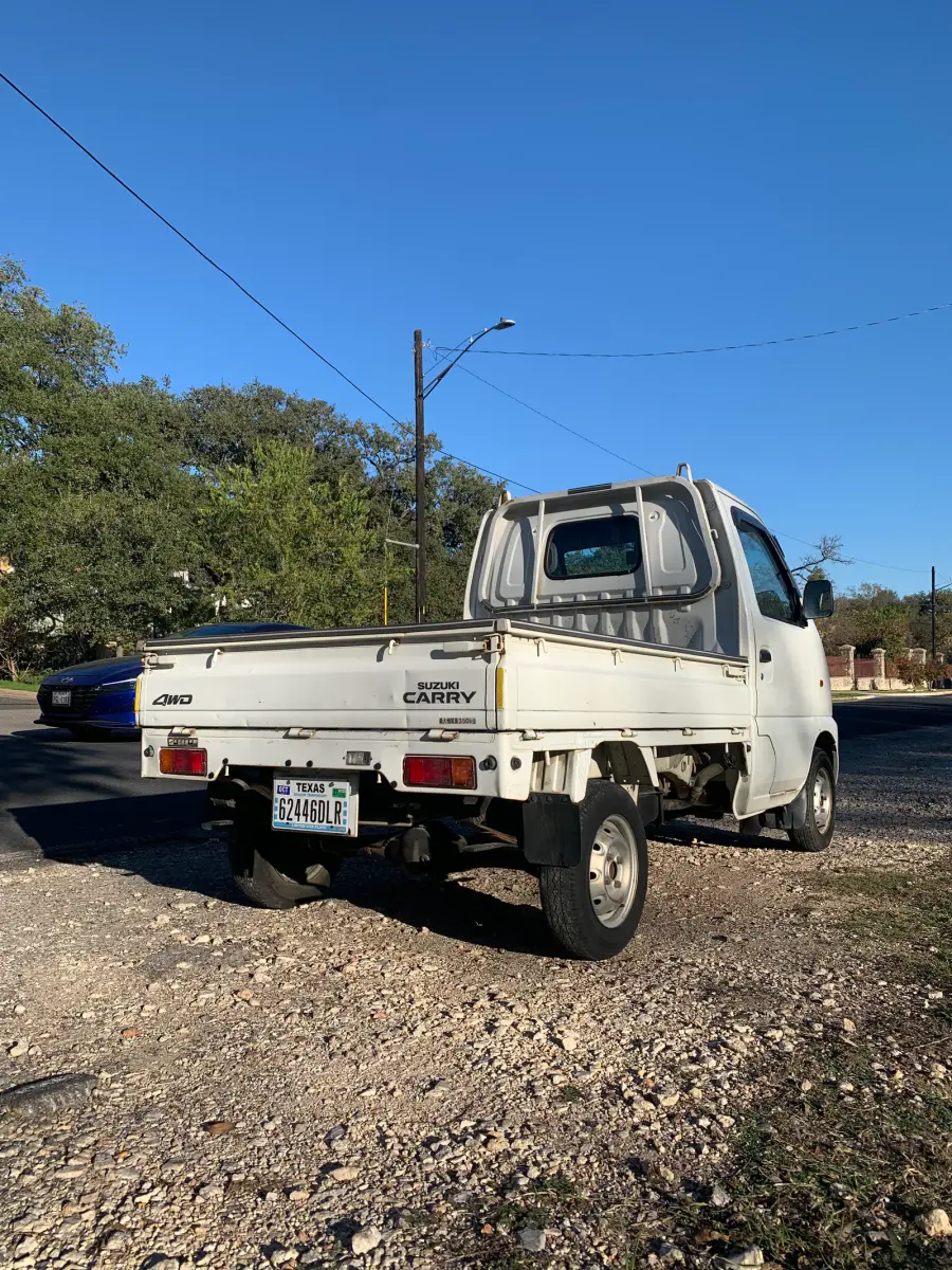 1999 Suzuki Carry, 4WD and AC, a Kei Truck, for sale at Sunshine Imports in Austin, TX (photo 5 of 10)