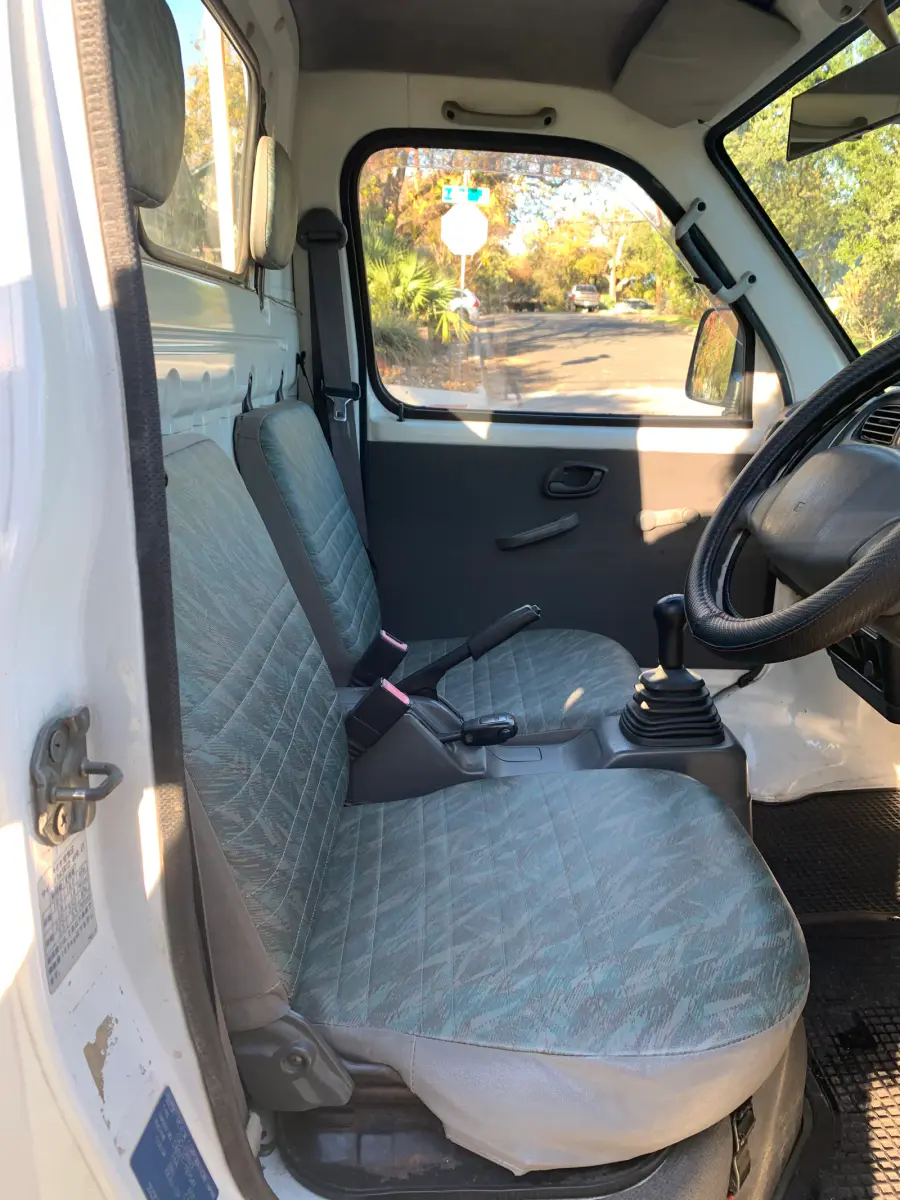 1999 Suzuki Carry, 4WD and AC, a Kei Truck, for sale at Sunshine Imports in Austin, TX (photo 6 of 10)