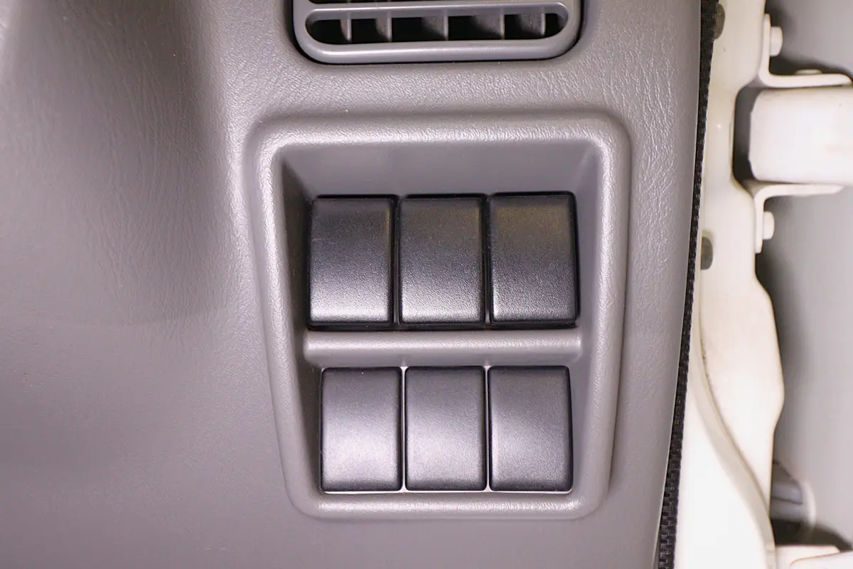 White 1999 Suzuki Carry 4x4 Kei Truck, dashboard switch blanks, for sale at Duncan Imports in Christiansburg, VA