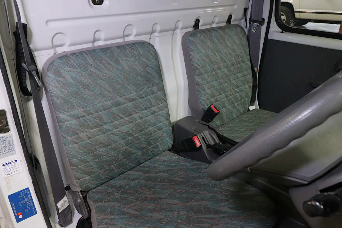 White 1999 Suzuki Carry 4x4 Kei Truck, cab seats, for sale at Duncan Imports in Christiansburg, VA