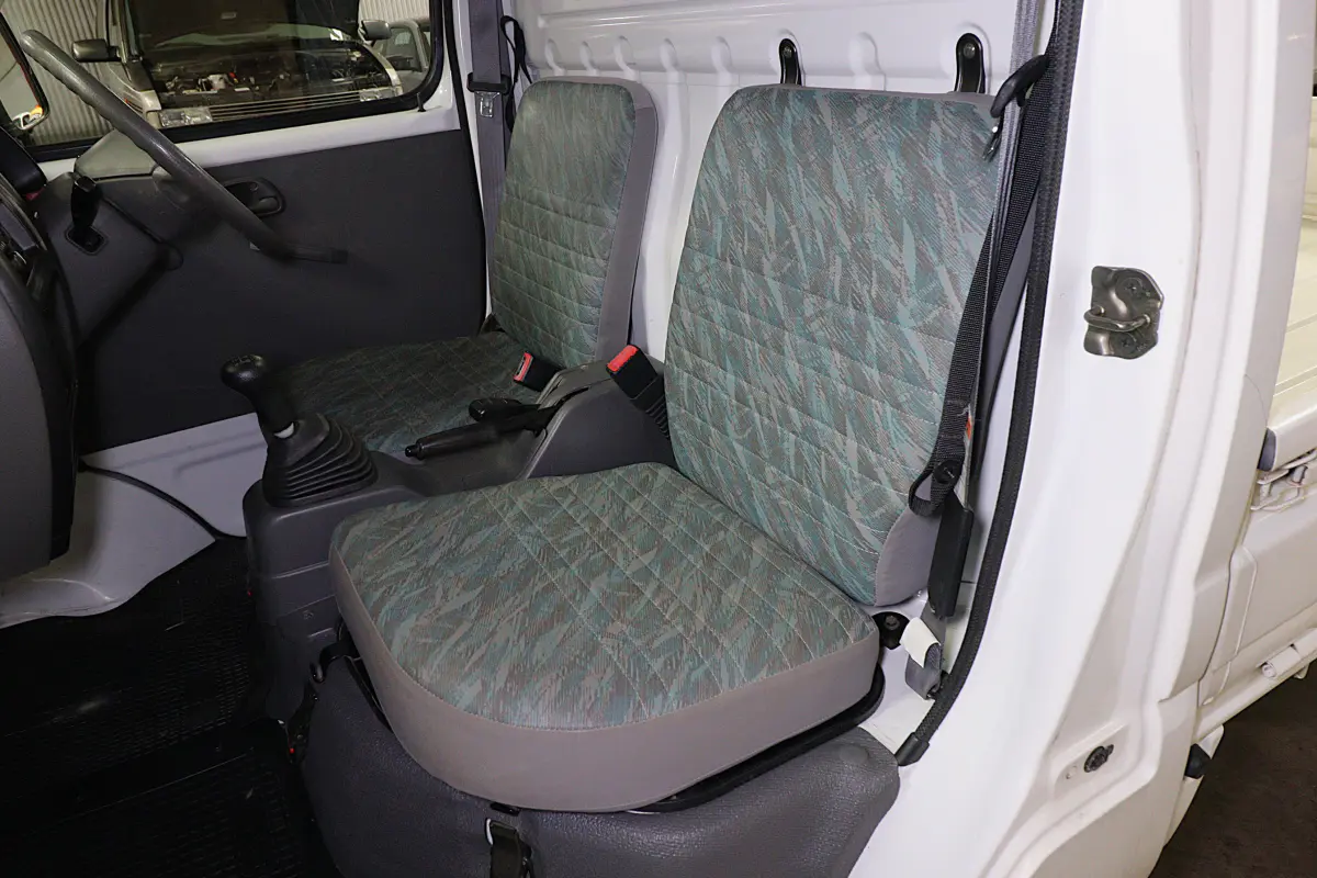 White 1999 Suzuki Carry 4x4 Kei Truck, cab seats view, for sale at Duncan Imports in Christiansburg, VA