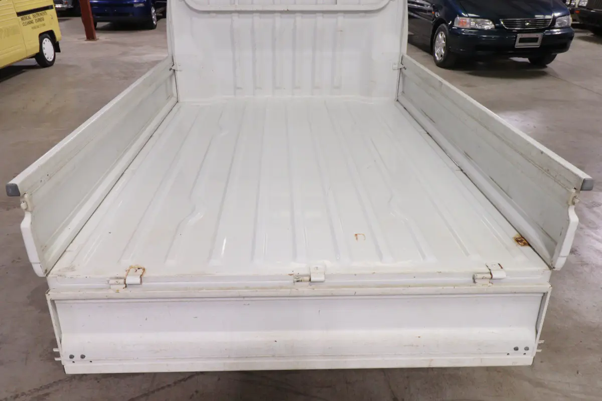 White 1999 Suzuki Carry 4x4 Kei Truck, cargo bed, for sale at Duncan Imports in Christiansburg, VA