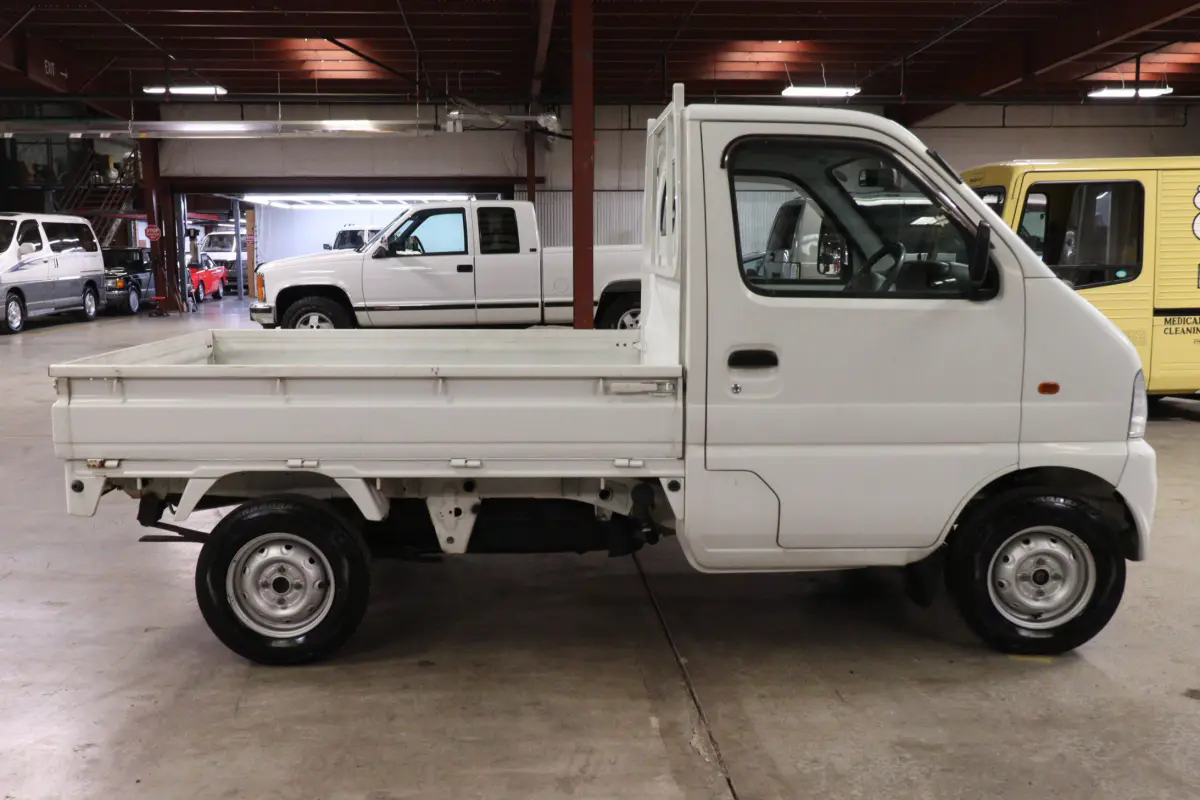 White 1999 Suzuki Carry 4x4 Kei Truck, side view, for sale at Duncan Imports in Christiansburg, VA
