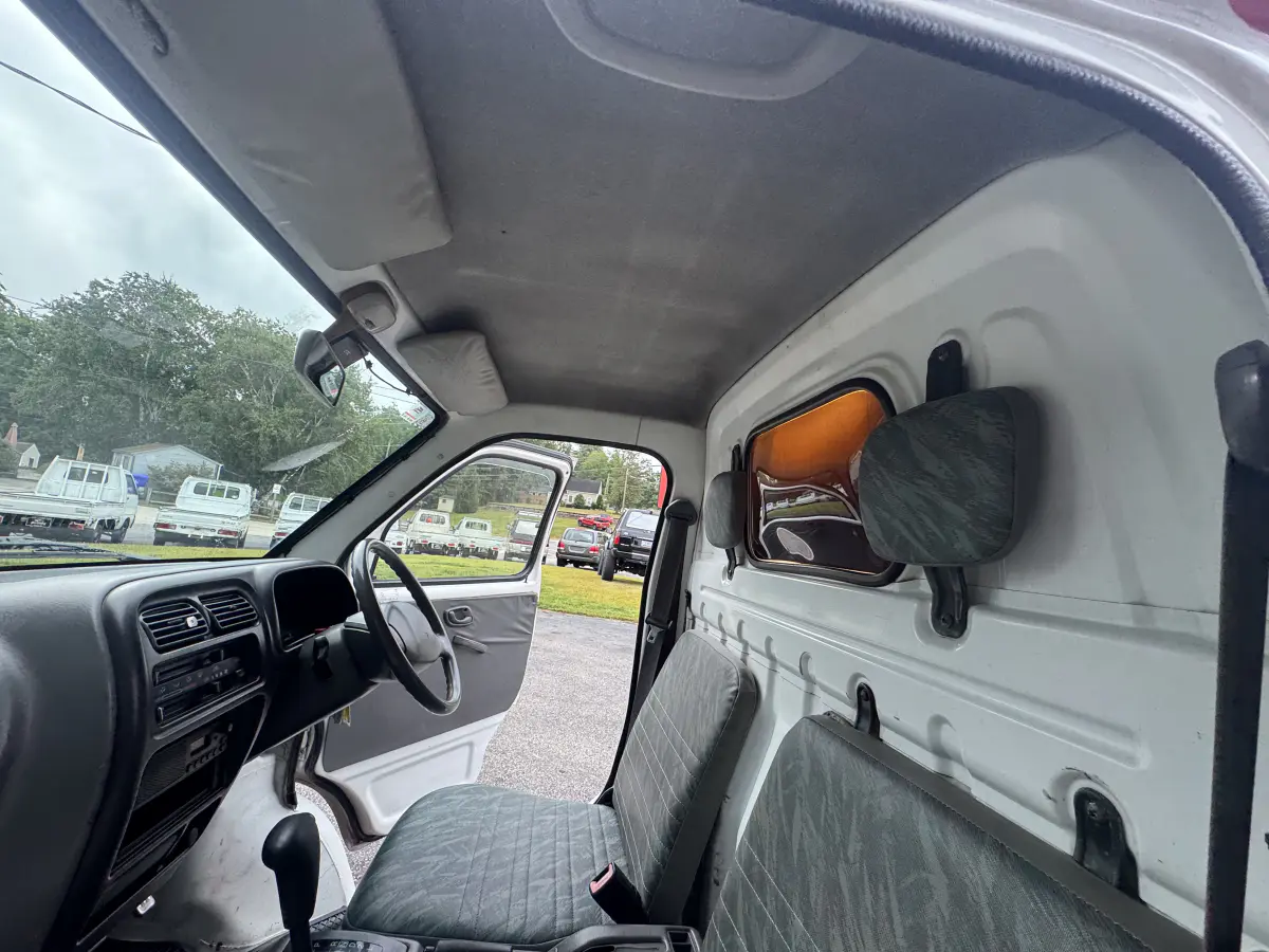 1999 Suzuki Carry, a Kei Truck, for sale at Northeast Auto Imports in Hudson, NH (photo 20 of 21)