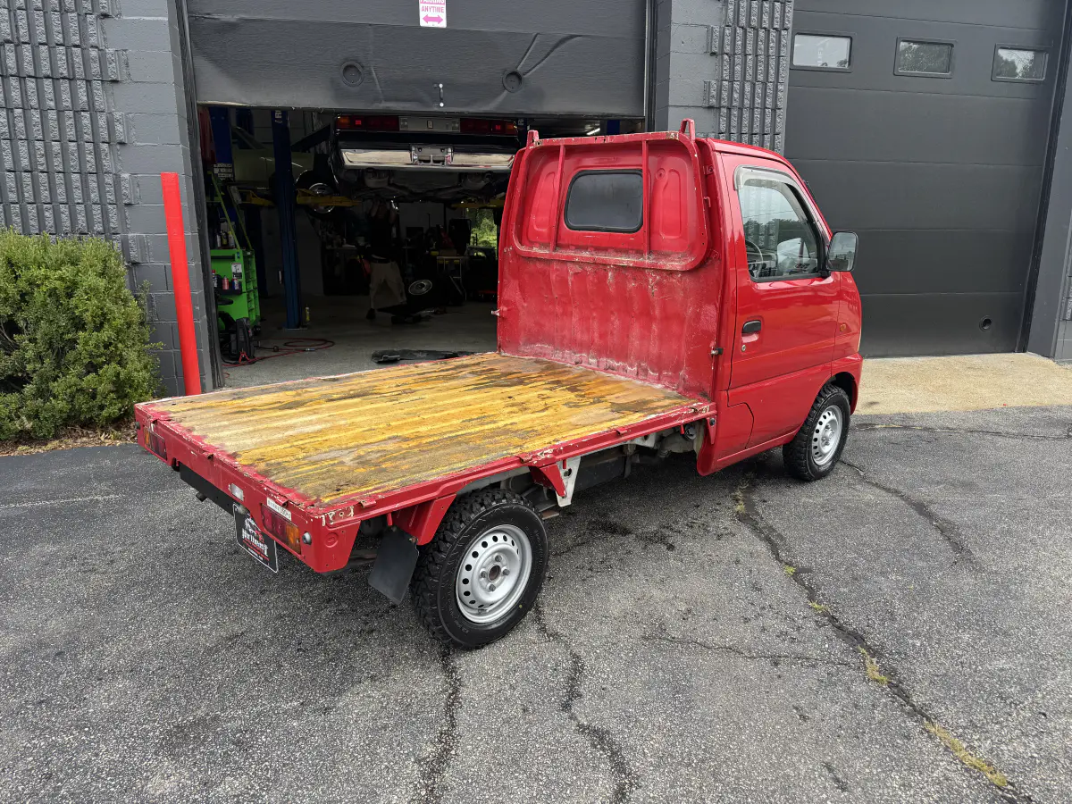 1999 Suzuki Carry, a Kei Truck, for sale at Northeast Auto Imports in Hudson, NH (photo 5 of 21)