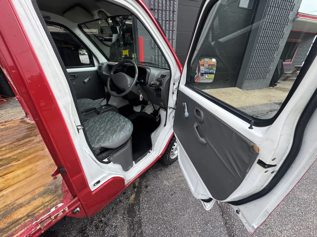 1999 Suzuki Carry, a Kei Truck, for sale at Northeast Auto Imports in Hudson, NH (photo 8 of 21)
