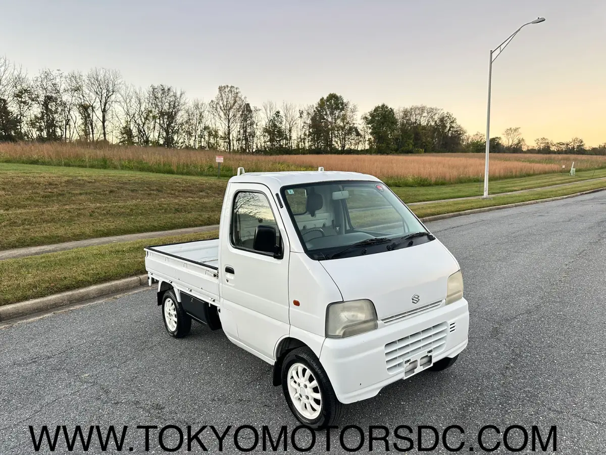 1999 Suzuki Carry Turbo 4WD, a Kei Truck, for sale at Tokyo Motors DC in Boyds, MD (photo 1 of 19)