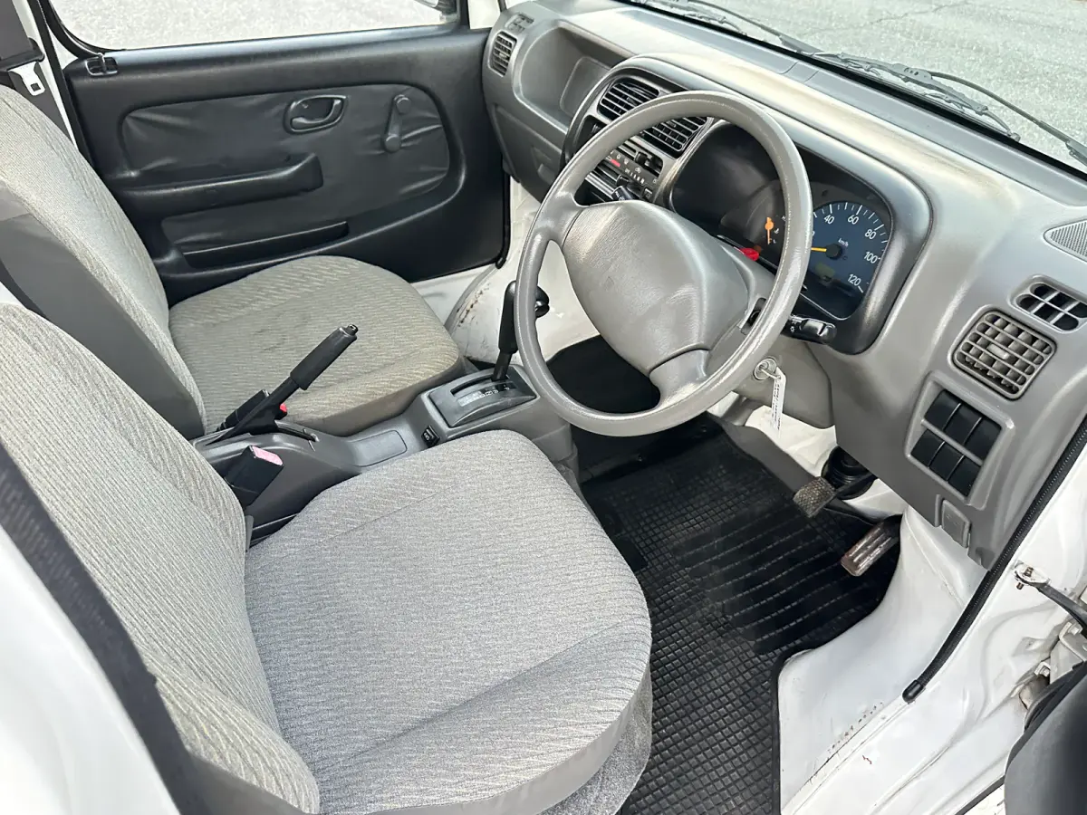 1999 Suzuki Carry Turbo 4WD, a Kei Truck, for sale at Tokyo Motors DC in Boyds, MD (photo 11 of 19)