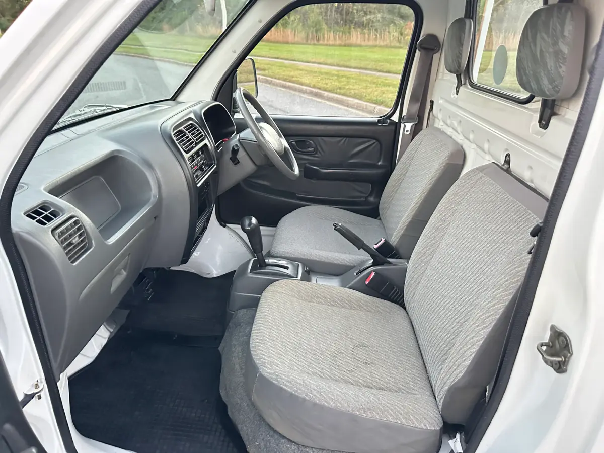 1999 Suzuki Carry Turbo 4WD, a Kei Truck, for sale at Tokyo Motors DC in Boyds, MD (photo 13 of 19)