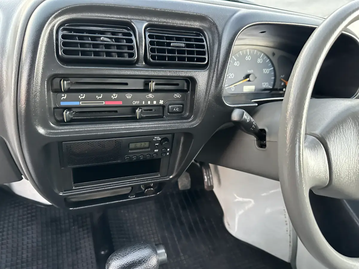 1999 Suzuki Carry Turbo 4WD, a Kei Truck, for sale at Tokyo Motors DC in Boyds, MD (photo 15 of 19)