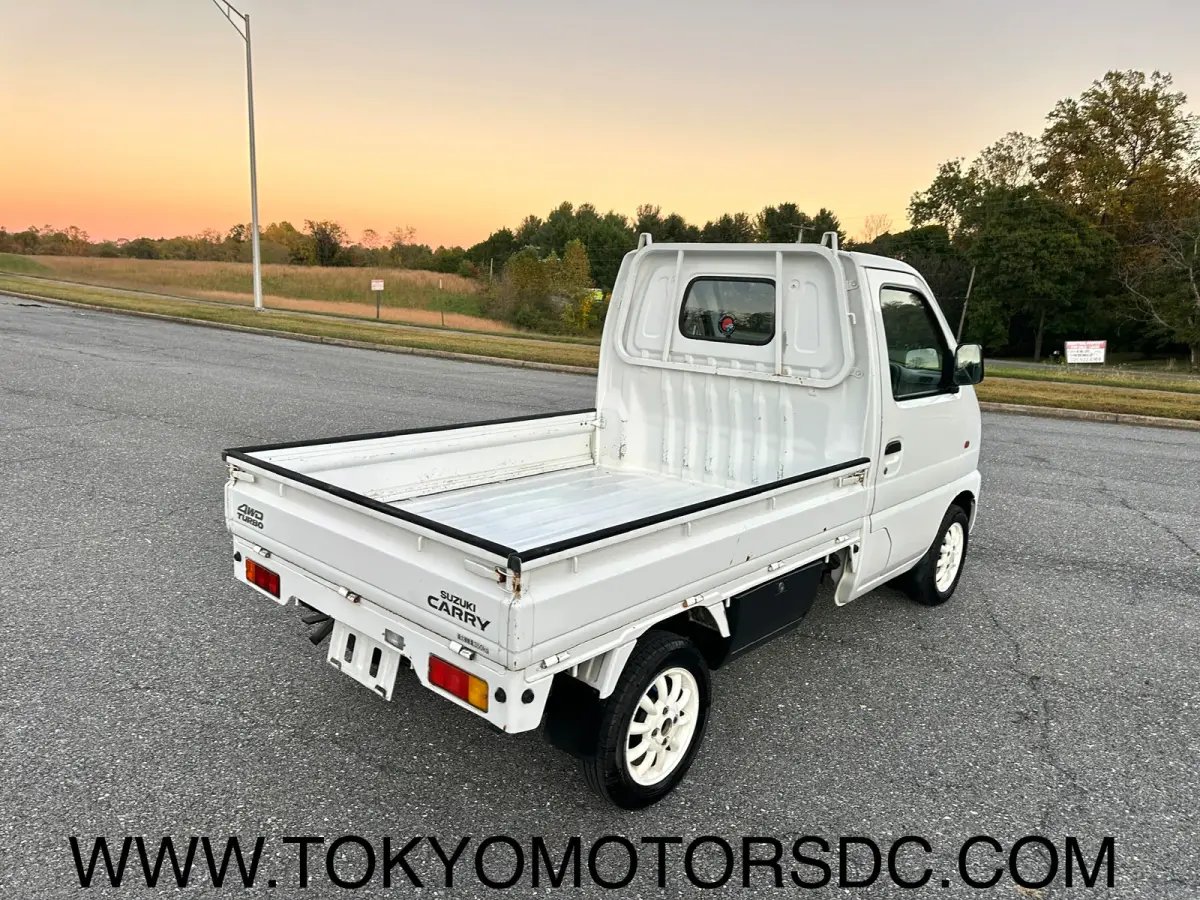 1999 Suzuki Carry Turbo 4WD, a Kei Truck, for sale at Tokyo Motors DC in Boyds, MD (photo 4 of 19)