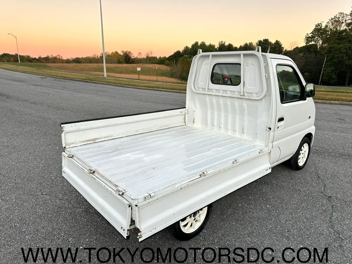 1999 Suzuki Carry Turbo 4WD, a Kei Truck, for sale at Tokyo Motors DC in Boyds, MD (photo 5 of 19)