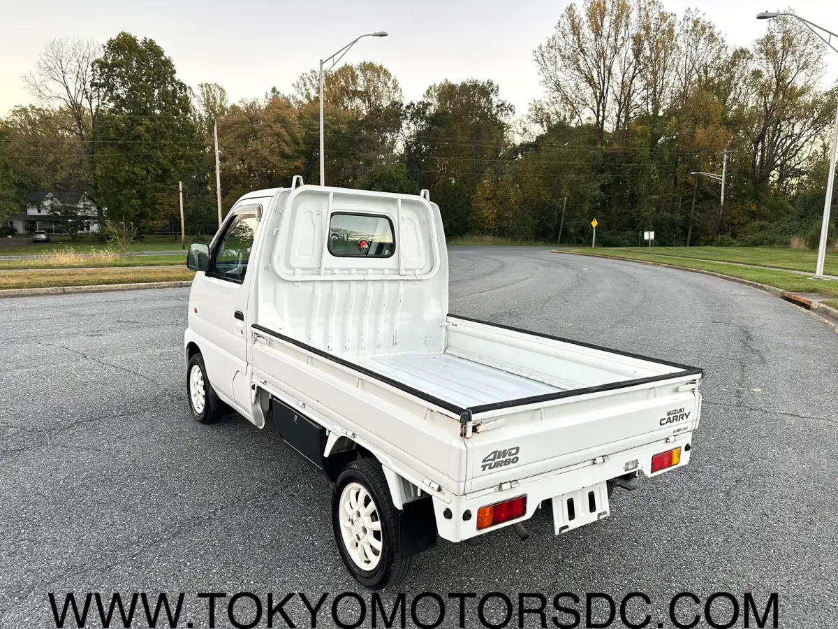 1999 Suzuki Carry Turbo 4WD, a Kei Truck, for sale at Tokyo Motors DC in Boyds, MD (photo 7 of 19)