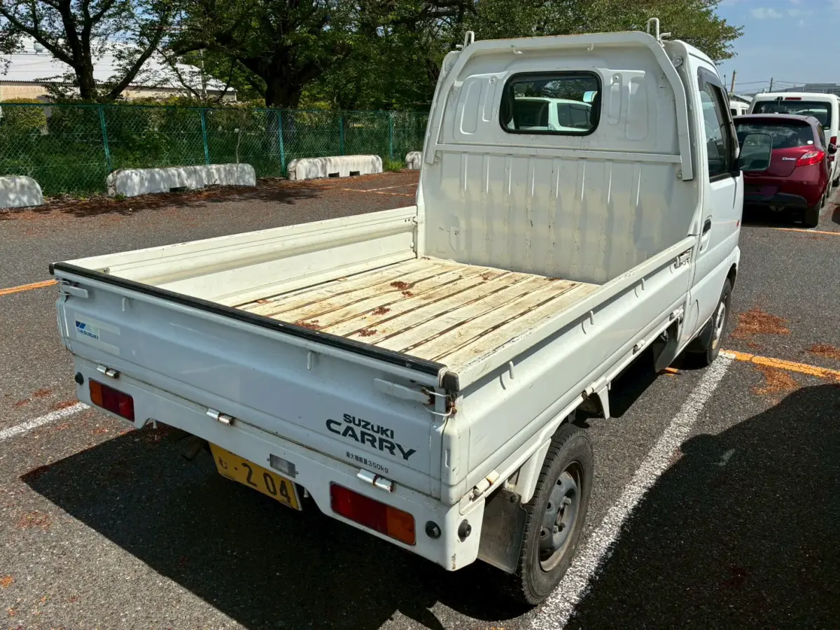 2000 Suzuki Carry, a white Kei Truck, for sale at Weatherford Mini Trucks in Weatherford, TX (photo 3 of 11)