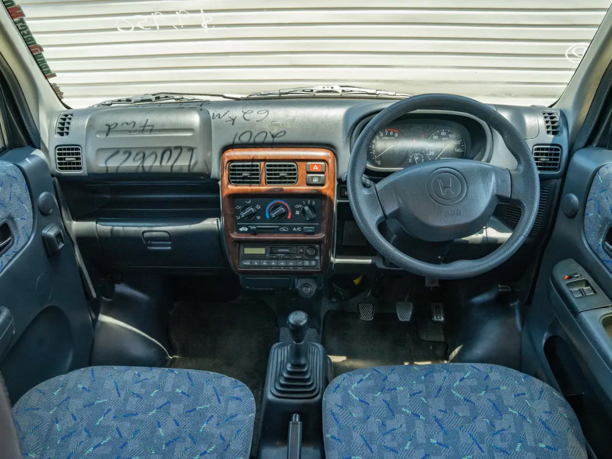 2001 Honda Vamos 4WD, a silver Kei Van, for sale at Japan Direct Motors in Irmo, SC (photo 11 of 12)