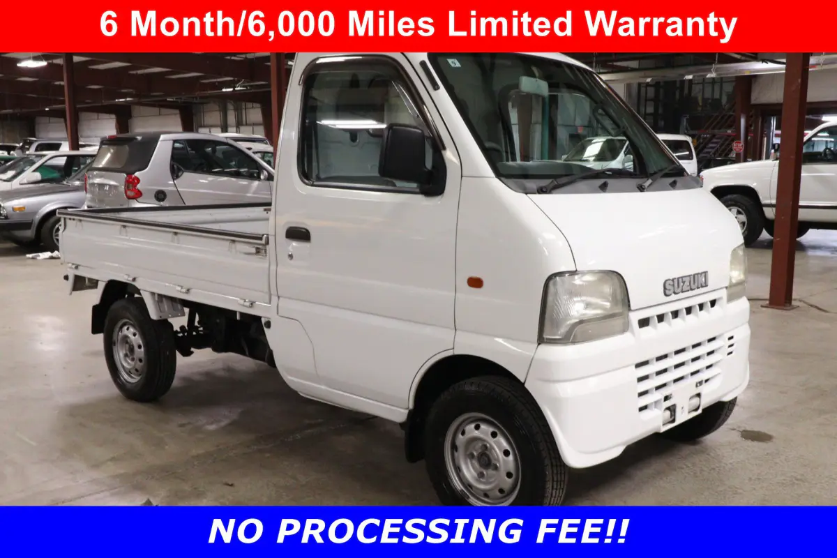 2001 Suzuki Carry 4x4 Kei Truck, front three-quarter view, for sale at Duncan Imports in Christiansburg, VA