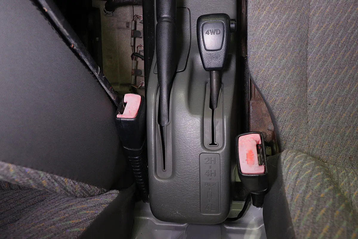 2001 Suzuki Carry 4x4 Kei Truck, 4WD lever and handbrake, for sale at Duncan Imports in Christiansburg, VA