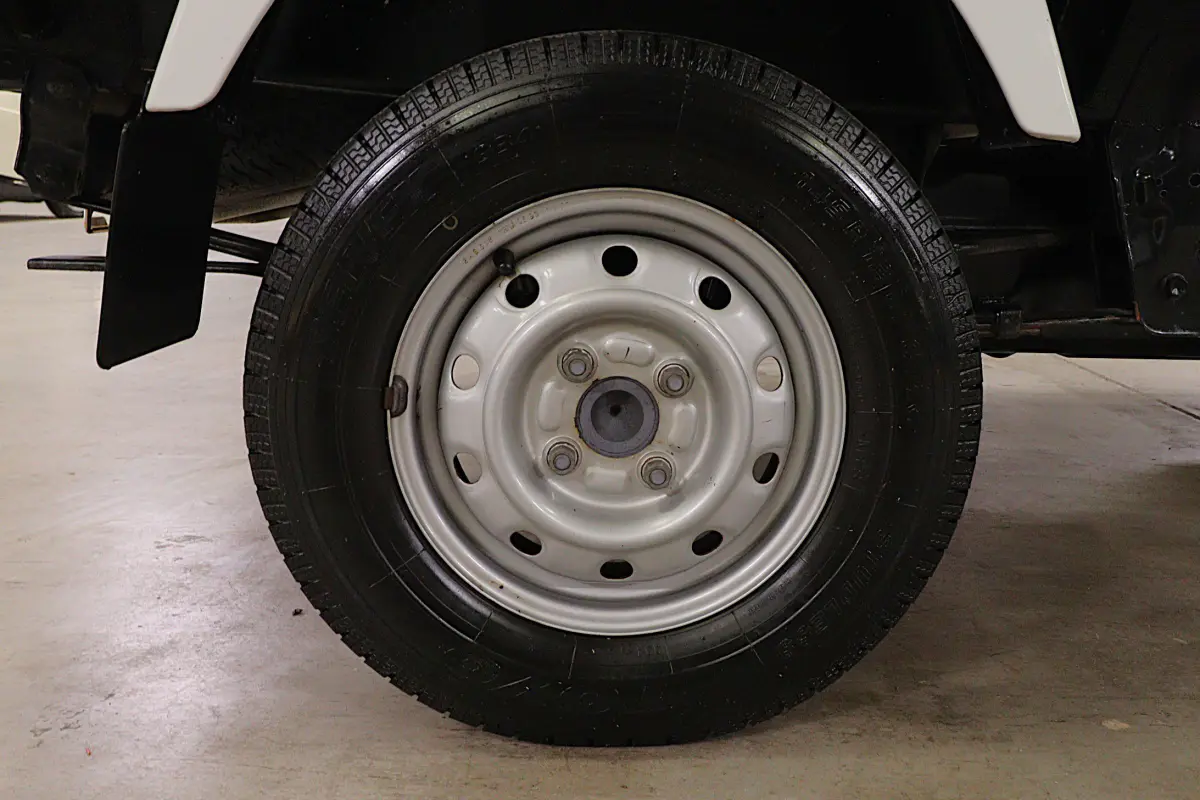 2001 Suzuki Carry 4x4 Kei Truck, rear wheel and tire, for sale at Duncan Imports in Christiansburg, VA