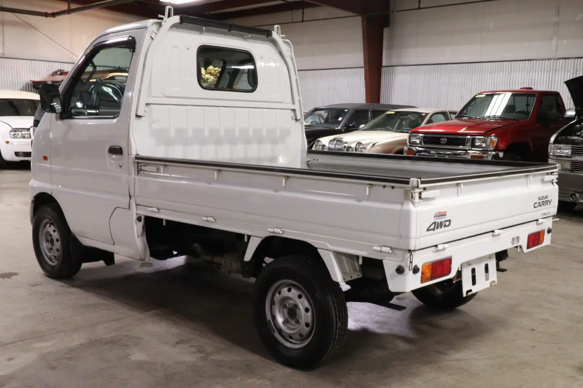 2001 Suzuki Carry 4x4 Kei Truck, rear three-quarter view, for sale at Duncan Imports in Christiansburg, VA