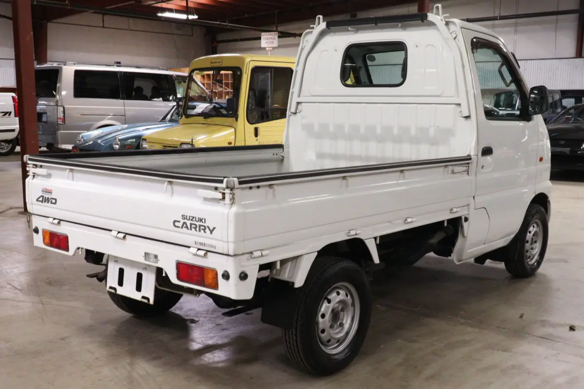 2001 Suzuki Carry 4x4 Kei Truck, rear three-quarter view, for sale at Duncan Imports in Christiansburg, VA
