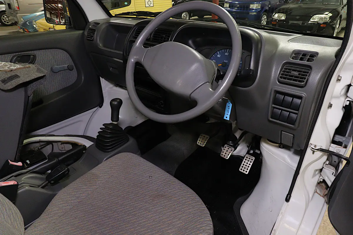 2001 Suzuki Carry 4x4 Kei Truck, cab interior, for sale at Duncan Imports in Christiansburg, VA