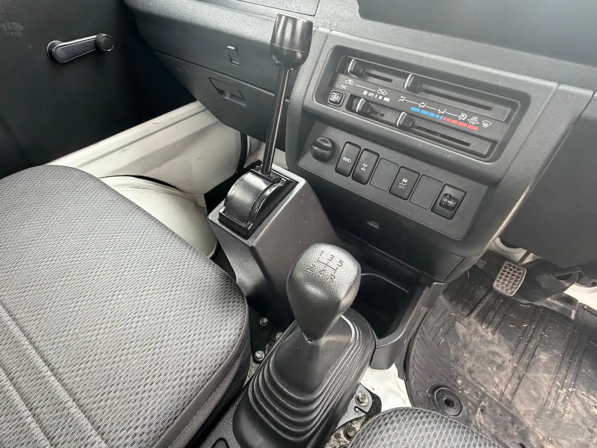 2021 Daihatsu Hijet HD Dump, a white off-road Kei Truck, for sale at Weatherford Mini Trucks in Weatherford, TX (photo 11 of 12)