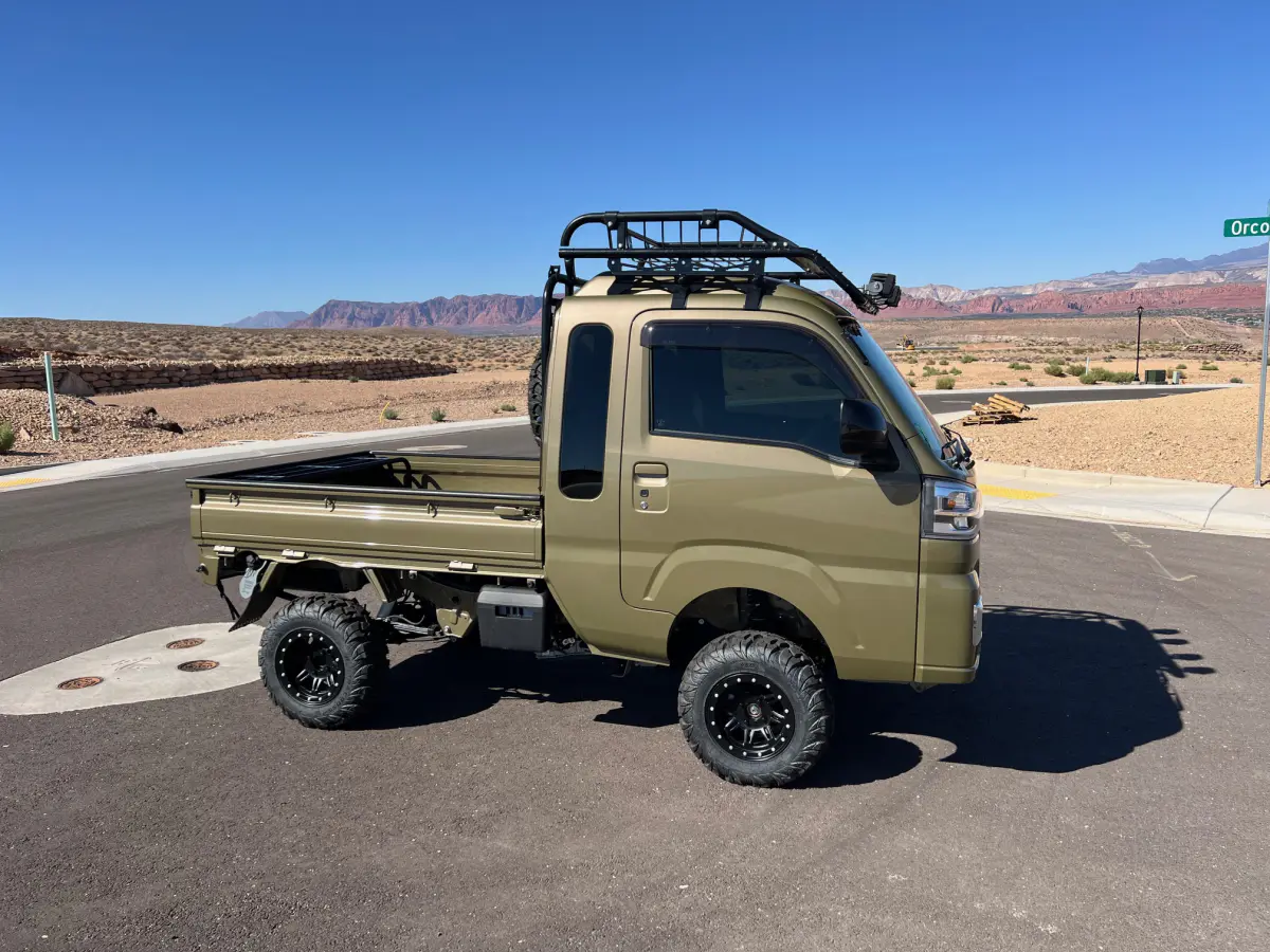 2022 Daihatsu Hijet Extreme, a green off-road Kei Truck, for sale at Mini Monsters USA in St. George, UT (photo 2 of 11)