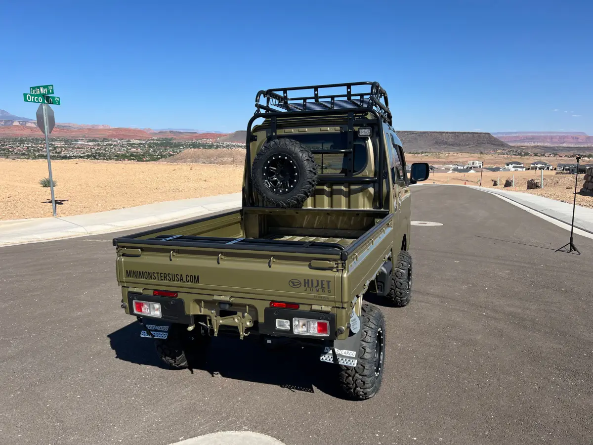 2022 Daihatsu Hijet Extreme, a green off-road Kei Truck, for sale at Mini Monsters USA in St. George, UT (photo 4 of 11)