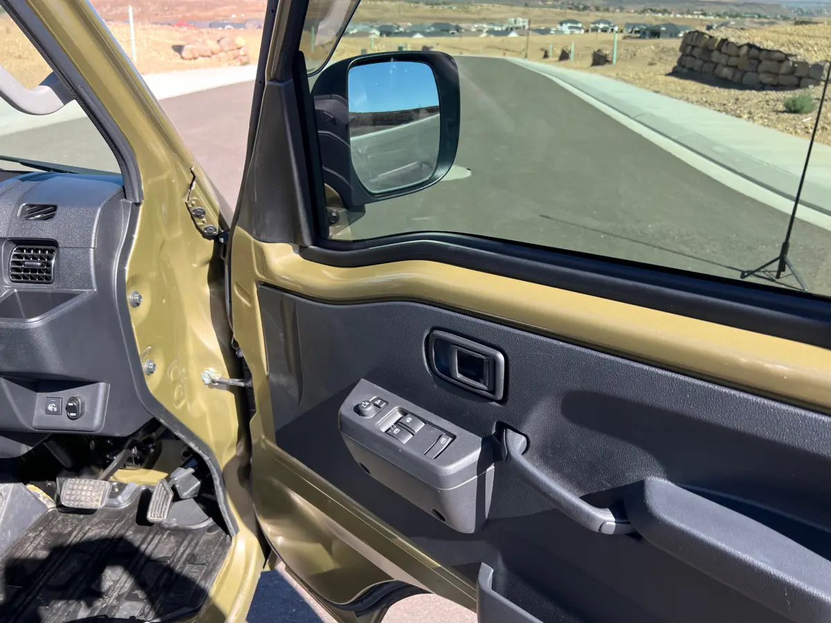2022 Daihatsu Hijet Extreme, a green off-road Kei Truck, for sale at Mini Monsters USA in St. George, UT (photo 9 of 11)