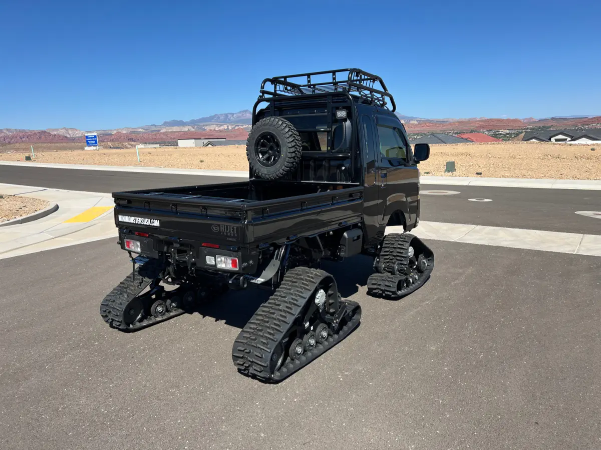2022 Daihatsu Hijet Extreme, a black off-road Kei Truck, for sale at Mini Monsters USA in St. George, UT (photo 4 of 11)