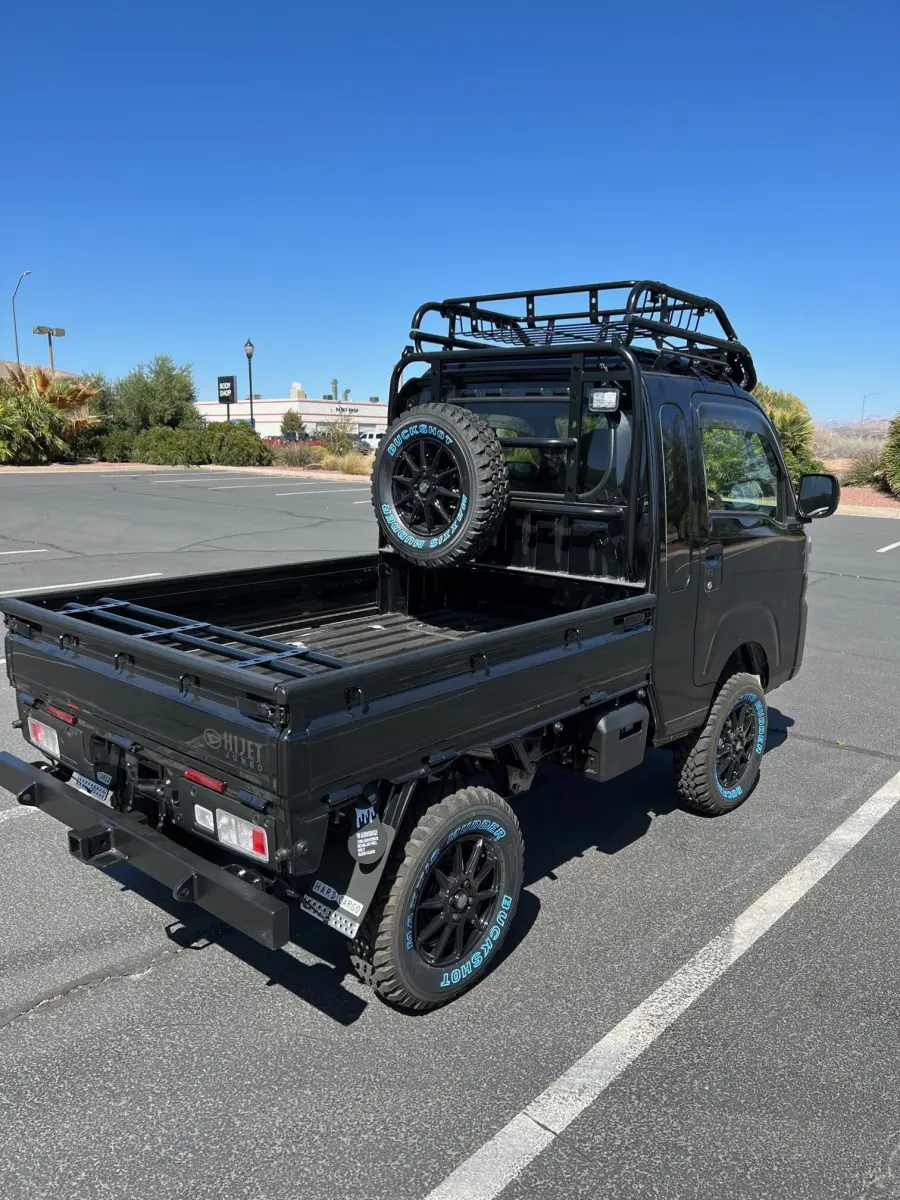 2022 Daihatsu Hijet Extreme, a black off-road Kei Truck, for sale at Mini Monsters USA in St. George, UT (photo 10 of 12)