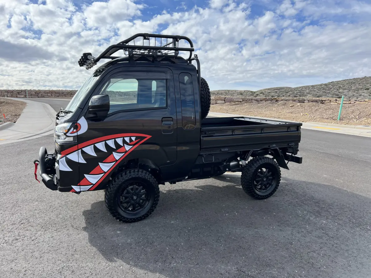 2022 Daihatsu Hijet Extreme, a black off-road Kei Truck, for sale at Mini Monsters USA in St. George, UT (photo 2 of 12)