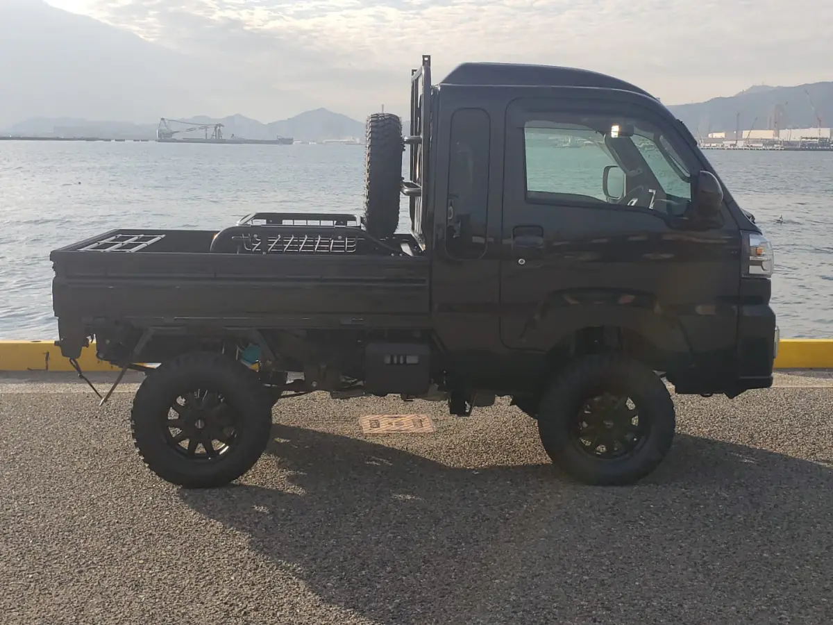 2022 Daihatsu Hijet Extreme, a black off-road Kei Truck, for sale at Mini Monsters USA in St. George, UT (photo 3 of 12)
