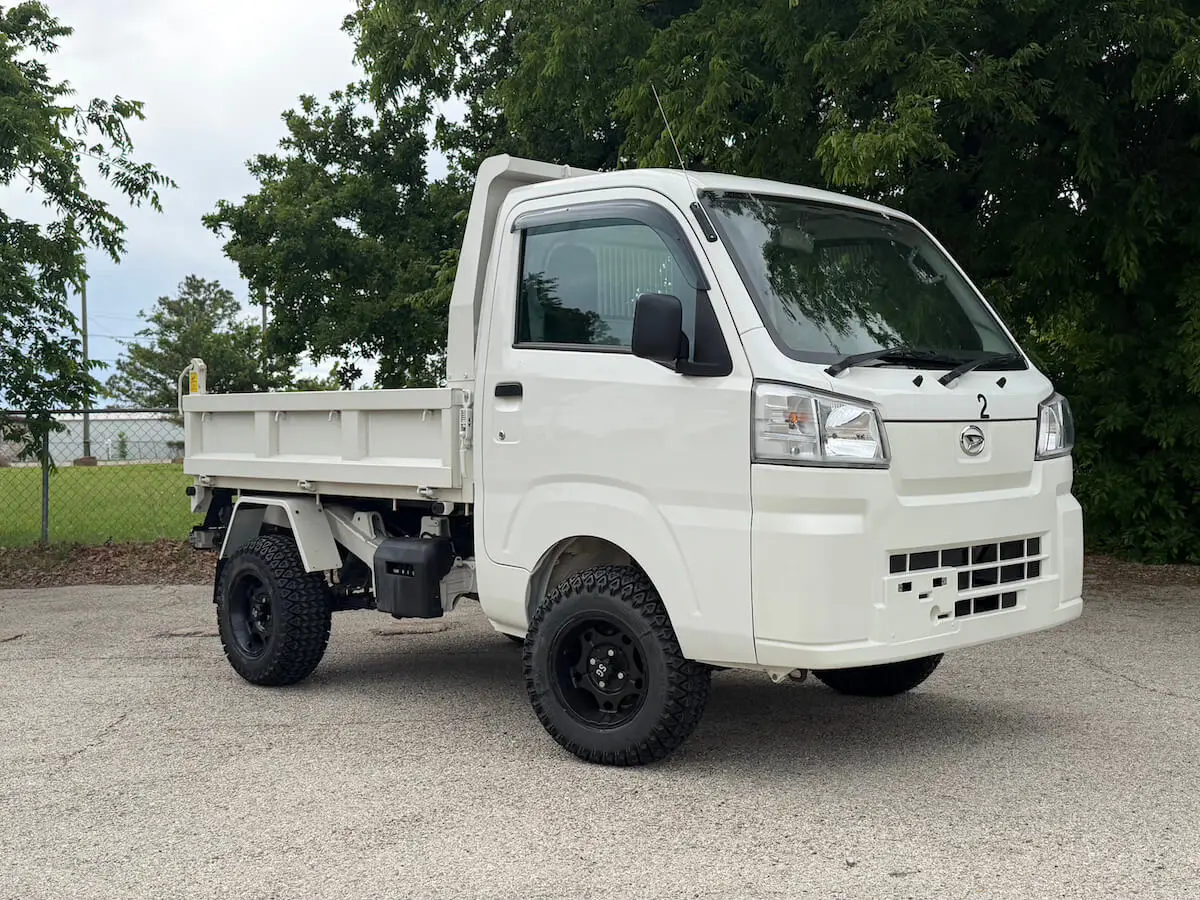 2022 Daihatsu Hijet HD Dump, a white off-road Kei Truck, for sale at Weatherford Mini Trucks in Weatherford, TX (photo 1 of 12)