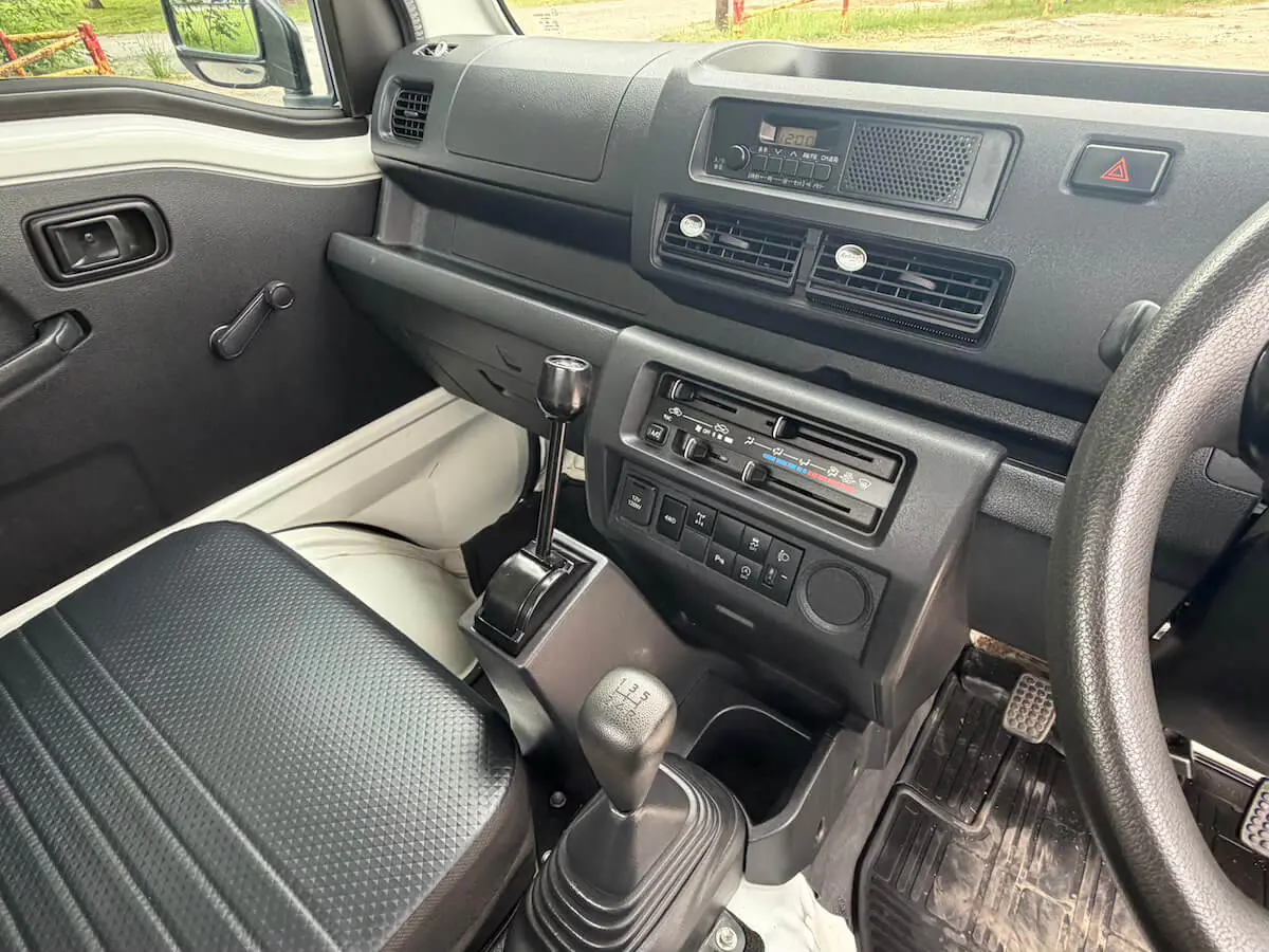 2022 Daihatsu Hijet HD Dump, a white off-road Kei Truck, for sale at Weatherford Mini Trucks in Weatherford, TX (photo 11 of 12)