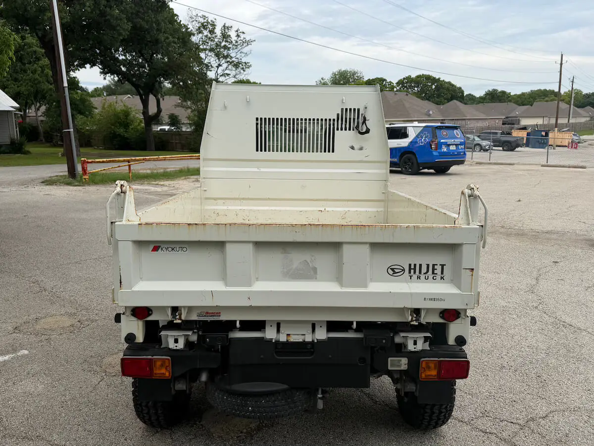 2022 Daihatsu Hijet HD Dump, a white off-road Kei Truck, for sale at Weatherford Mini Trucks in Weatherford, TX (photo 3 of 12)