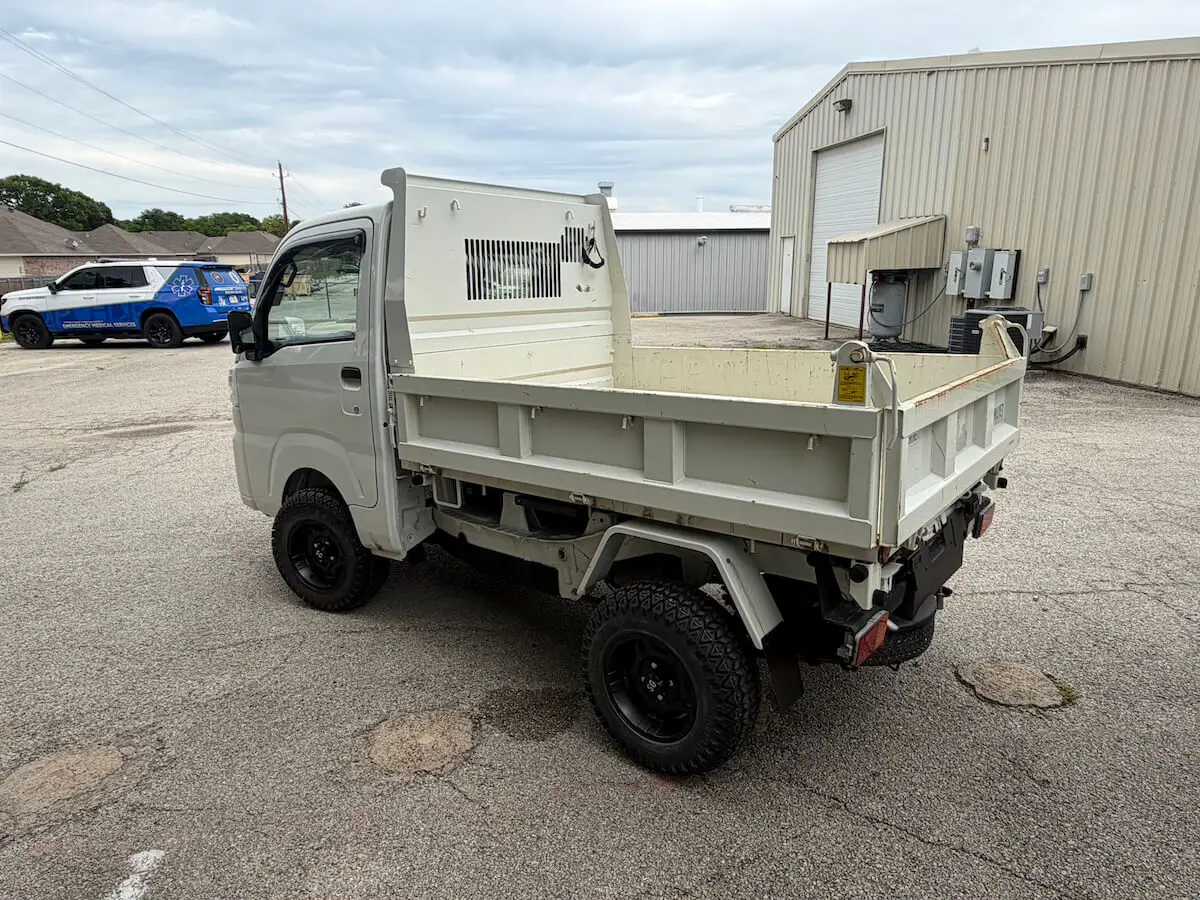 2022 Daihatsu Hijet HD Dump, a white off-road Kei Truck, for sale at Weatherford Mini Trucks in Weatherford, TX (photo 4 of 12)
