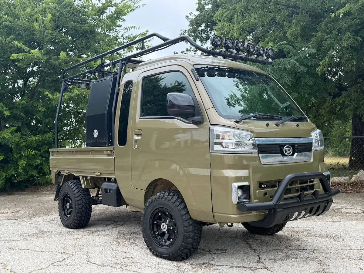 2022 Daihatsu Hijet Jumbo Cab**Tons of Upgrades, a khaki green off-road Kei Truck, for sale at Weatherford Mini Trucks in Weatherford, TX (photo 1 of 12)