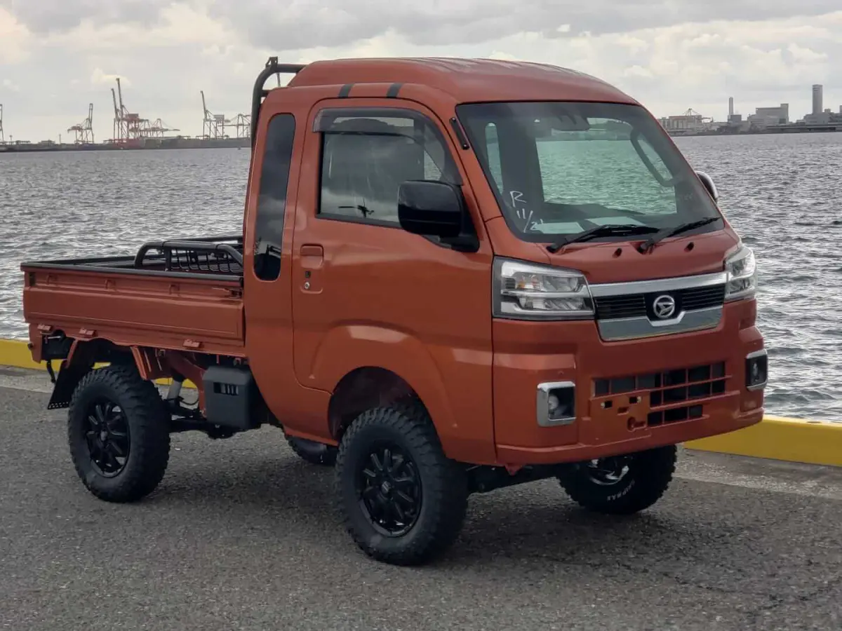 2022 Daihatsu Hijet Jumbo Extreme, a desert orange off-road Kei Truck, for sale at Mini Monsters USA in St. George, UT (photo 2 of 12)