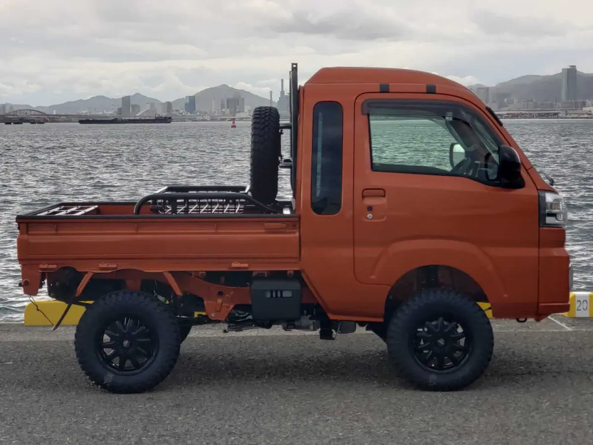 2022 Daihatsu Hijet Jumbo Extreme, a desert orange off-road Kei Truck, for sale at Mini Monsters USA in St. George, UT (photo 3 of 12)