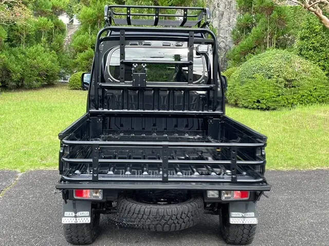 2022 Daihatsu Hijet Jumbo, a black off-road Kei Truck, for sale at Mini Monsters USA in St. George, UT (photo 4 of 12)