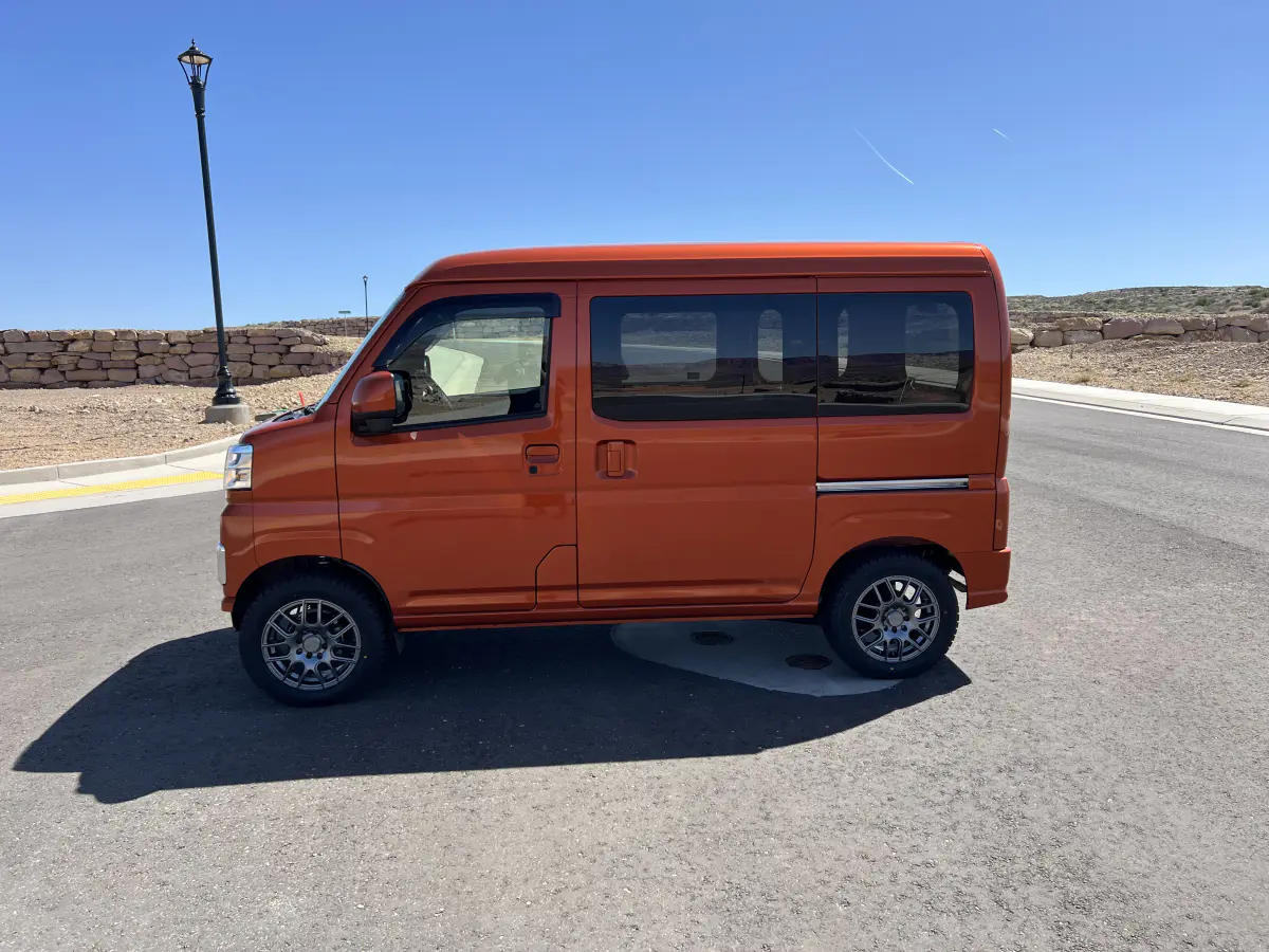 2023 Daihatsu Hijet Cargo Van, a desert orange off-road Kei Van, for sale at Mini Monsters USA in St. George, UT (photo 8 of 12)