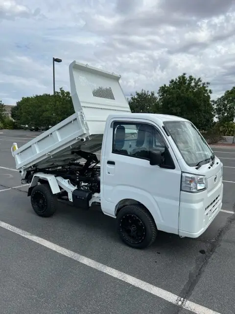 2023 Daihatsu Hijet HD Dump, a whiteout off-road Kei Truck, for sale at Mini Monsters USA in St. George, UT (photo 1 of 12)
