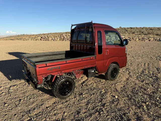 2023 Daihatsu Hijet Jumbo, a red off-road Kei Truck, for sale at Mini Monsters USA in St. George, UT (photo 3 of 12)