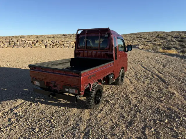 2023 Daihatsu Hijet Jumbo, a red off-road Kei Truck, for sale at Mini Monsters USA in St. George, UT (photo 4 of 12)